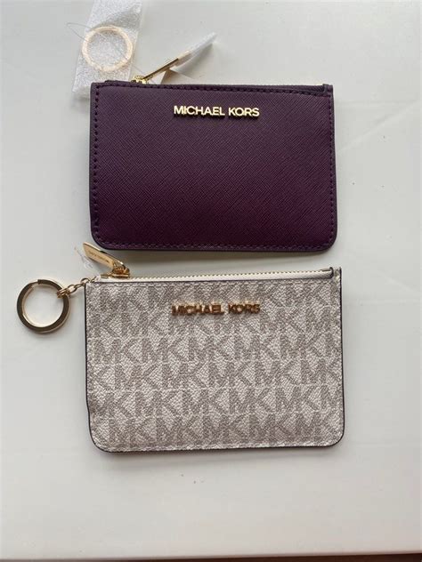 does michael kors sell wallets|Michael Kors outlet clearance wallets.